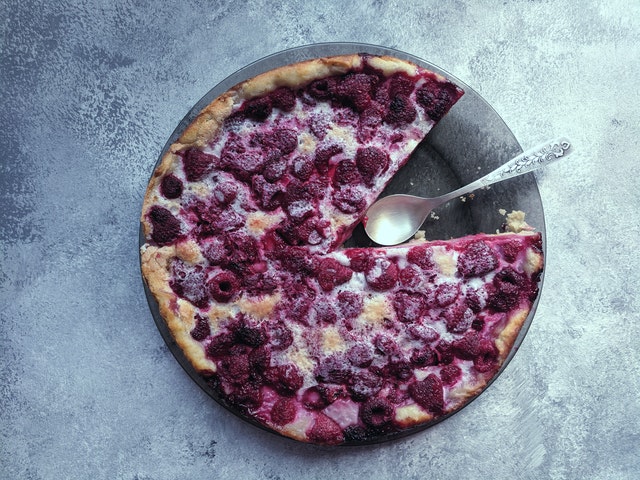 berry pie with piece missing